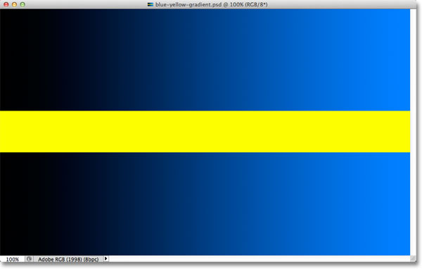A dark to light blue gradient divided by a yellow horizontal bar. Image © 2012 Photoshop Essentials.com