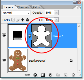 Adobe Photoshop tutorial image: The shape layer in the Layers palette now clearly showing the shape of the gingerbread man.