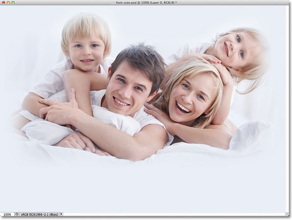 A photo of a couple with two children. Image licensed from Fotolia by Photoshop Essentials.com