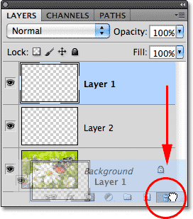 Dragging a layer down on to the Trash Bin. Image © 2011 Photoshop Essentials.com