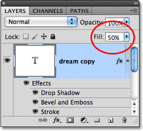 Lowering the Fill value of the text to 50%, with layer styles applied to the text. Image © 2011 Photoshop Essentials.com