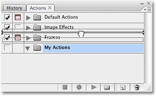 Dragging an action set to a new location in the Actions palette. Image copyright © 2008 Photoshop Essentials.com