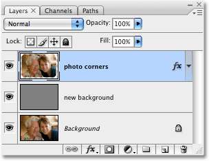 The Layers palette showing the '4 corners' layer now merged with the 'photo corners' layer. Image copyright © 2008 Photoshop Essentials.com