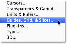 Selecting Photoshop's Guides, Grid & Slices Preferences. Image © 2011 Photoshop Essentials.com