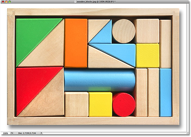 The color of the wooden block has been changed. Image © 2009 Photoshop Essentials.com