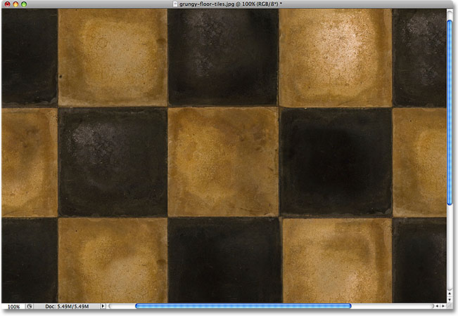 Grungy floor tiles. Image licensed from iStockphoto by Photoshop Essentials.com