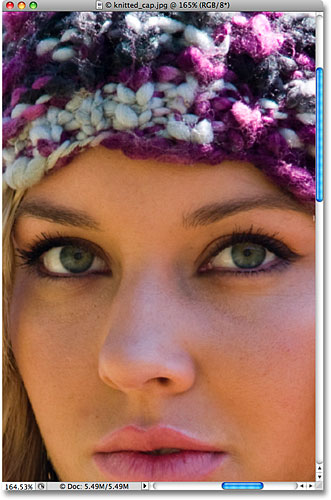 Zooming in on the woman's eyes in Photoshop. Image © 2009 Photoshop Essentials.com