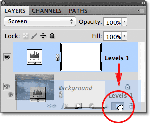 Dragging the Levels adjustment layer down onto the New Layer icon in the Layers panel. Image © 2011 Photoshop Essentials.com