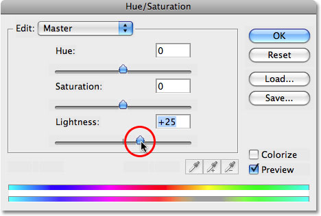 Drag the Lightness slider to the right to brighten the teeth.  Image © 2008 Photoshop Essentials.com.