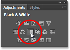 Selecting a Black and White adjustment layer from the Adjustments panel. Image © 2013 Photoshop Essentials.com