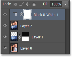 The Layers panel showing the new Black and White adjustment layer. Image © 2013 Photoshop Essentials.com