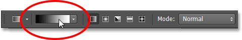 Clicking the gradient preview bar. Image © 2013 Photoshop Essentials.com