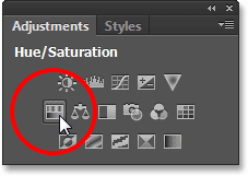 Selecting a Hue/Saturation adjustment layer from the Adjustments panel. Image © 2013 Photoshop Essentials.com