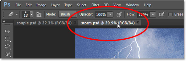 Switching between open photos by clicking on the tabs in Photoshop CS6. Image © 2013 Photoshop Essentials.com