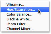 Adding a Hue/Saturation adjustment layer. Image © 2014 Photoshop Essentials.com.