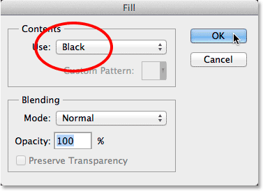 Setting the Use option to Black in the Fill dialog box. Image © 2014 Photoshop Essentials.com.