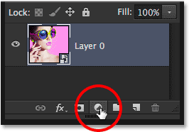 Clicking the New Fill or Adjustment Layer icon. Image © 2014 Photoshop Essentials.com.