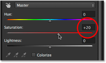 Increasing color saturation in the image with a Hue-Saturation adjustment layer. Image © 2014 Photoshop Essentials.com.