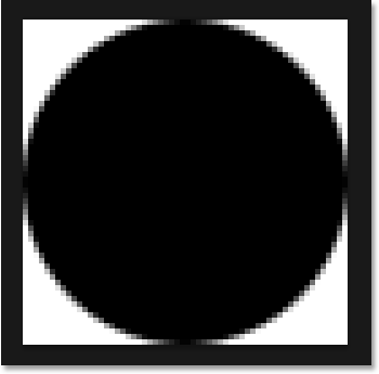 The circular selection is now filled with black. Image © 2014 Photoshop Essentials.com.