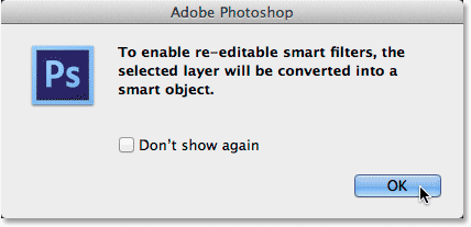 Photoshop lets you know it's about to convert the layer into a Smart Object. Image © 2014 Photoshop Essentials.com.