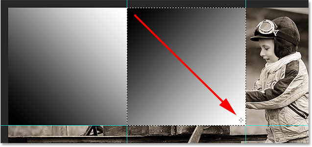 Drawing a second black to white gradient in the document. Image © 2014 Photoshop Essentials.com