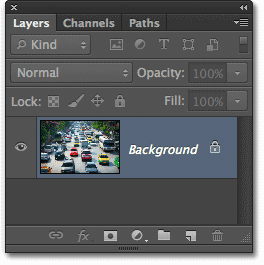 The Background layer in the Layers panel in Photoshop CS6. Image © 2012 Photoshop Essentials.com