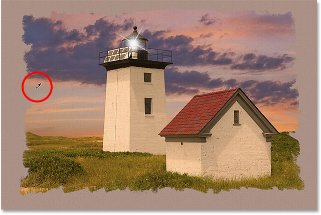 Sampling a yellow color from the light house to use as my canvas color. Image © 2013 Photoshop Essentials.com