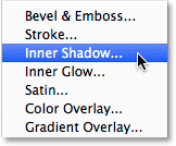Choosing an Inner Shadow layer style. Image © 2014 Photoshop Essentials.com.