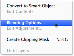 Selecting the Blending Options from the Layers panel menu. Image © 2014 Photoshop Essentials.com
