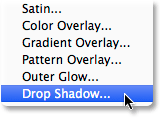 Adding a Drop Shadow layer style to the shape. Image © 2014 Photoshop Essentials.com