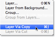 Selecting the New Layer via Copy command from the Layers menu in Photoshop. Image © 2014 Photoshop Essentials.com