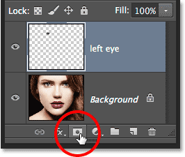 Clicking the Layer Mask icon at the bottom of the Layers panel. Image © 2014 Photoshop Essentials.com.