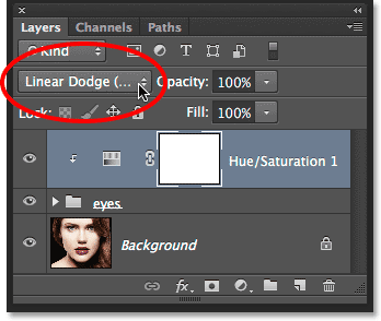 Changing the blend mode of the adjustment layer to Linear Dodge. Image © 2014 Photoshop Essentials.com.