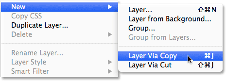 Choosing the New Layer via Copy command in Photoshop. Image © 2011 Photoshop Essentials.com.