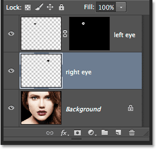 The Layers panel showing three layers in the document.  Image © 2014 Photoshop Essentials.com.