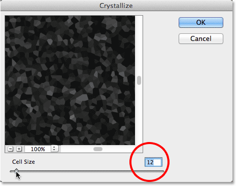 Setting the Cell Size value in the Crystallize dialog box. Image © 2013 Photoshop Essentials.com