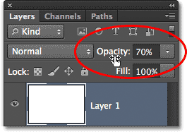 Lowering the opacity value for Layer 1. Image © 2013 Photoshop Essentials.com.