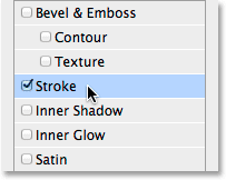 Selecting Stroke in the list of layer effects. Image © 2014 Photoshop Essentials.com.