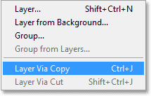 Selecting the New Layer via Copy command in the Layer menu in Photoshop. Image © 2013 Photoshop Essentials.com