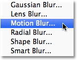 Selecting the Motion Blur filter in Photoshop. Image © 2011 Photoshop Essentials.com.