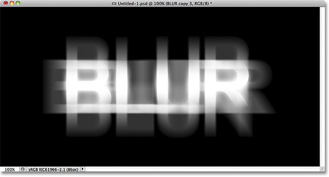 The glow around the text is now more intense. Image © 2011 Photoshop Essentials.com.