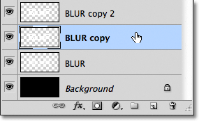 Selecting the copy of the text layer. Image © 2011 Photoshop Essentials.com.