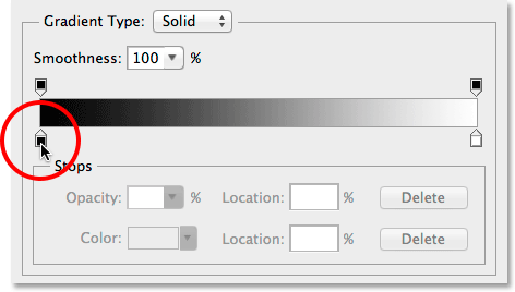Double-clicking the black color stop in the Gradient Editor. 