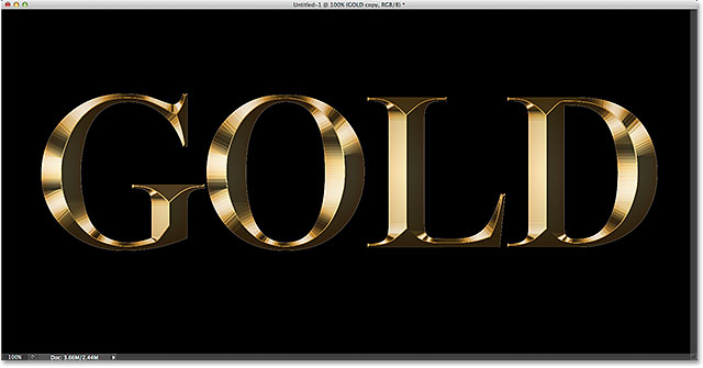The gold letter effect after applying the Inner Glow layer style. 