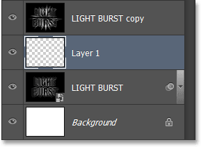 The Layers panel showing the new blank layer. Image © 2013 Photoshop Essentials.com
