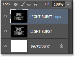 The Layers panel showing the copy of the text layer. Image © 2013 Photoshop Essentials.com