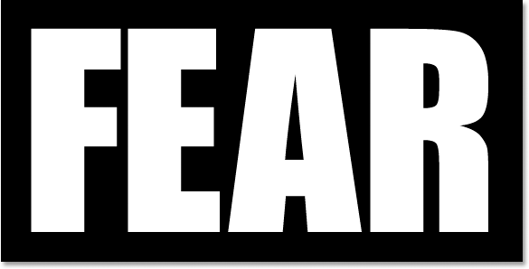 Typing the word 'FEAR' into the Photoshop Document.