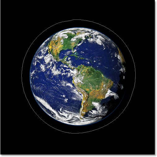 Adobe Photoshop Text Effects: The image now showing the path around the planet.