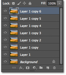 The Layers panel in Photoshop CS6 showing seven copies of the image above the Background layer. Image © 2012 Steve Patterson, Photoshop Essentials.com