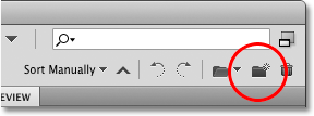 The New Folder icon in Adobe Bridge CS4. Image © 2010 Photoshop Essentials.com.